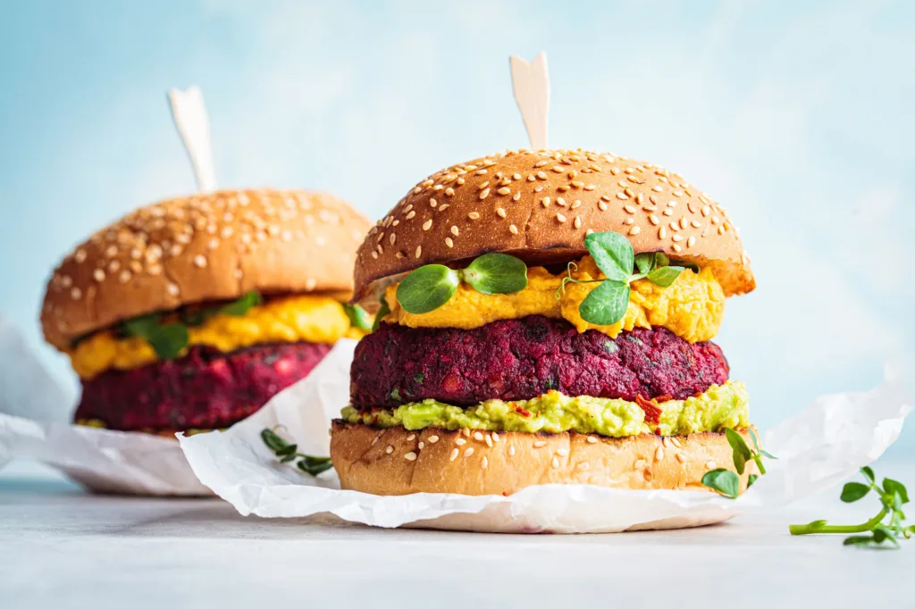 Meat free burgers made from plant-based ingredients such as vegetables, grains, legumes, and proteins derived from plants