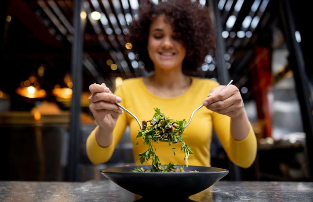 Healthy Asian women making plant-based salads to eat